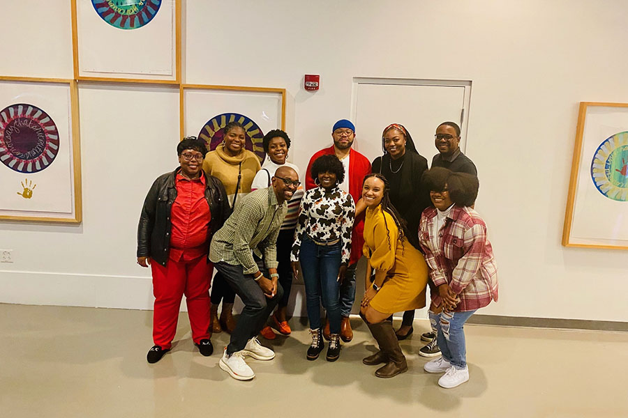 Group of Sankofa members posing at the August Wilson African American Cultural Center
