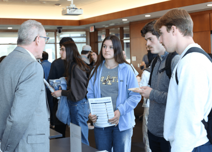 Students talk with Prof. Forrest Morgan