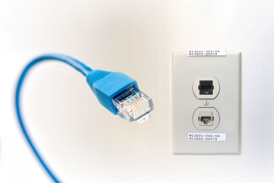 Image of an ethernet cable and outlet.