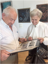 Howard Chandler meeting Paulina Plaksej, a Polish woman whose family sheltered Jews during the war