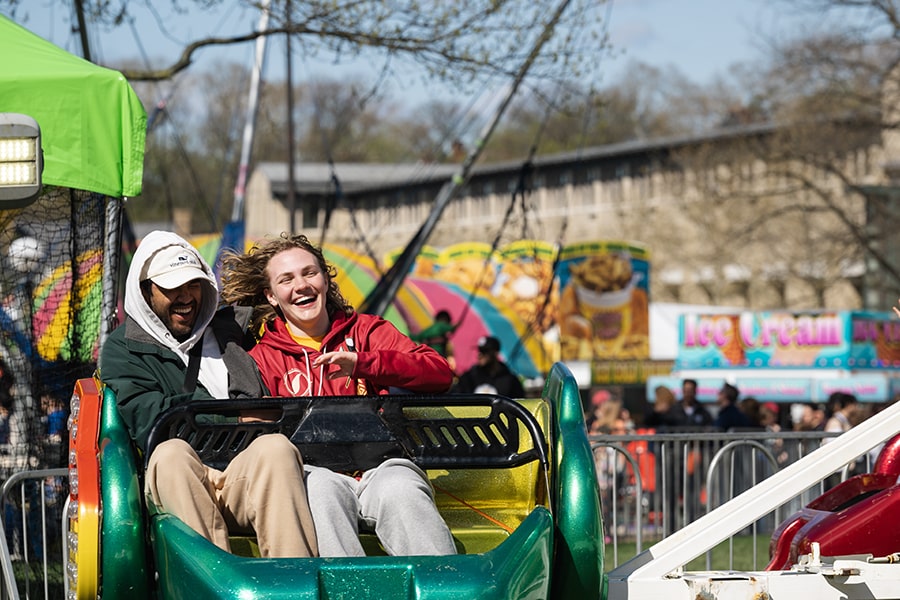 two people on a ride, Midway at Carnival