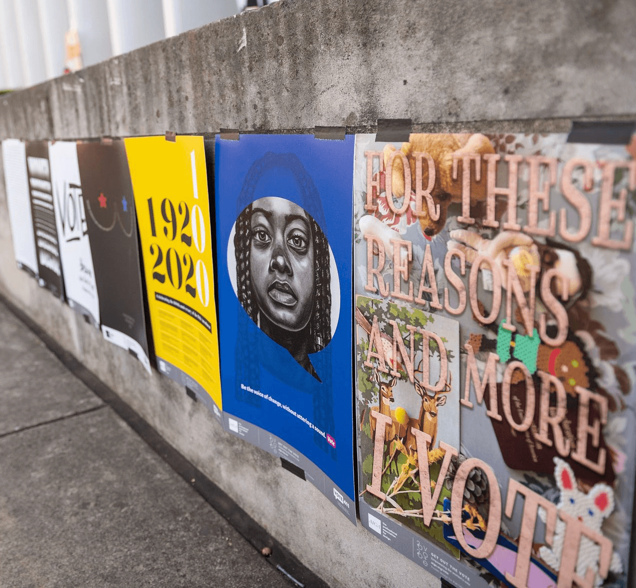 Democracy Day posters on a wall