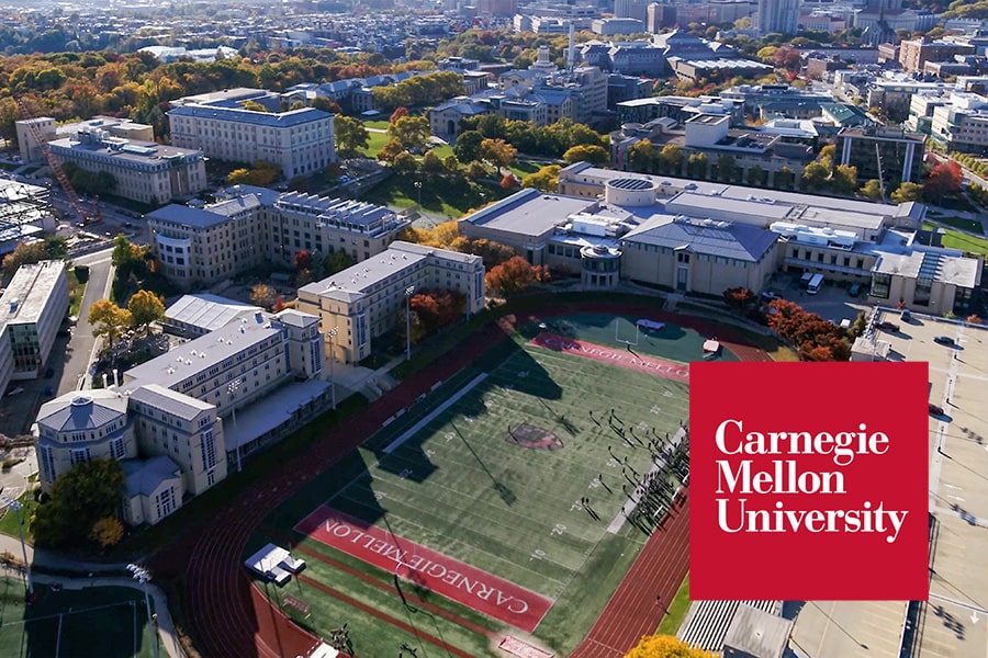 Aerial view of Carnegie Mellon University campus featuring Gesling Stadium and various academic buildings. The Carnegie Mellon University logo is prominently displayed in the foreground.