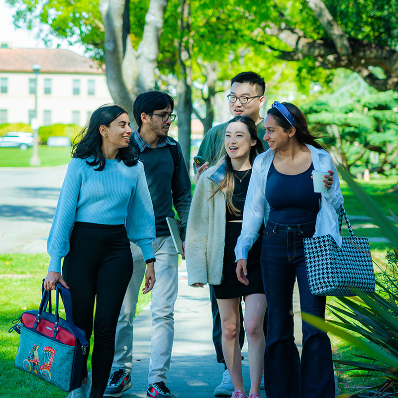 Students walking on a sidewalk at the Silicon Valley campus