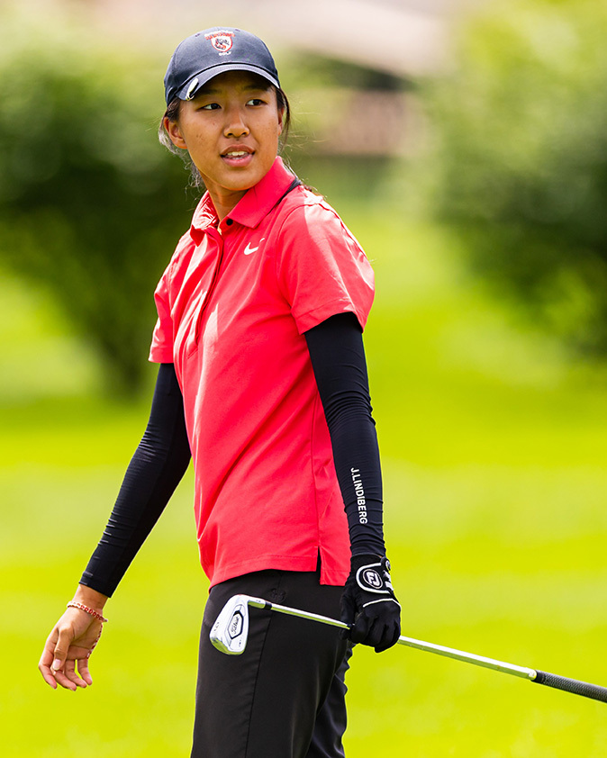 Samantha Wang walks on the green.