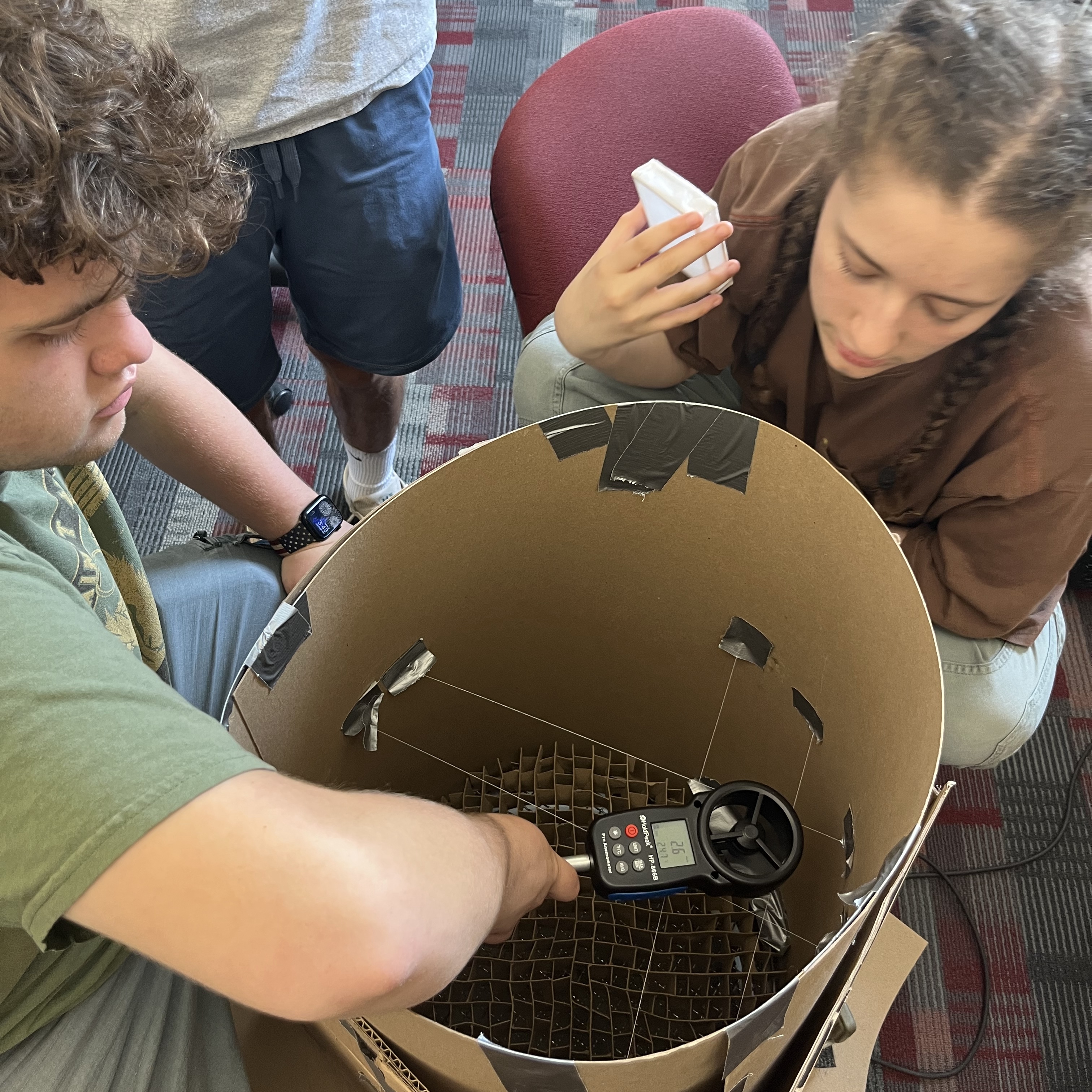 Students doing aerodynamics experiments