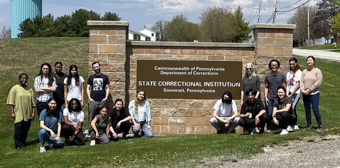 faculty and students at SCI Somerset sign