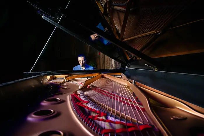 View of Frederic Chiu from other side of piano