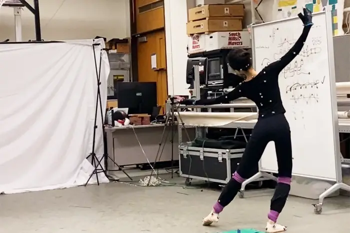 Wang dances in a motion capture suit.