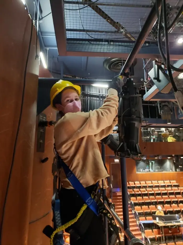 Liberty Lapayowker working on stage lighting during her first year at Carnegie Mellon.