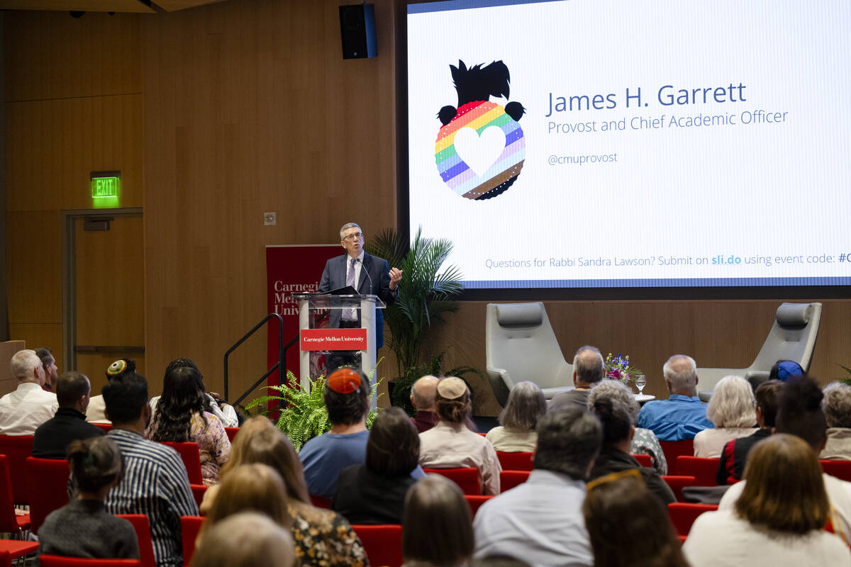 Provost James H. Garrett introduces Rabbi Sandra Lawson during the 2024 Pride Keynote Lecture.