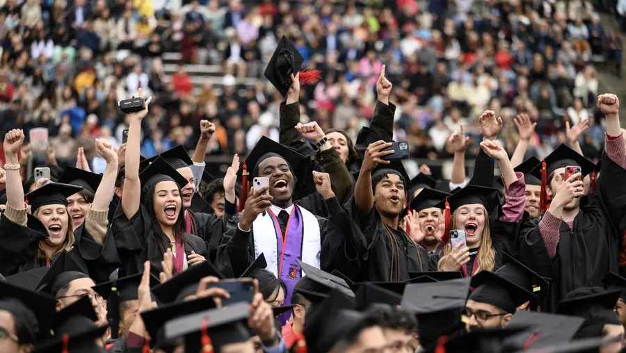 CMU graduates celebrate at Commencement.