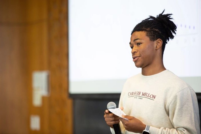 Pre-College AI Scholars student presenting.