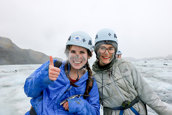 Images of Julie Olsen, hiking a glacier in Iceland