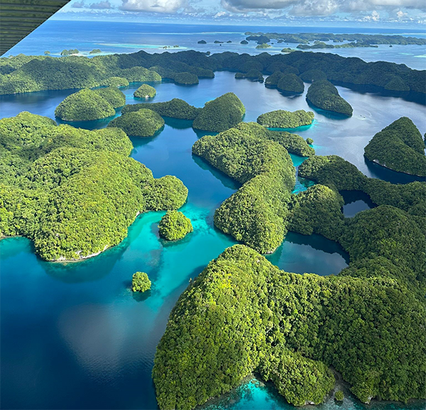 Image of lush green islands in a brilliant blue sea