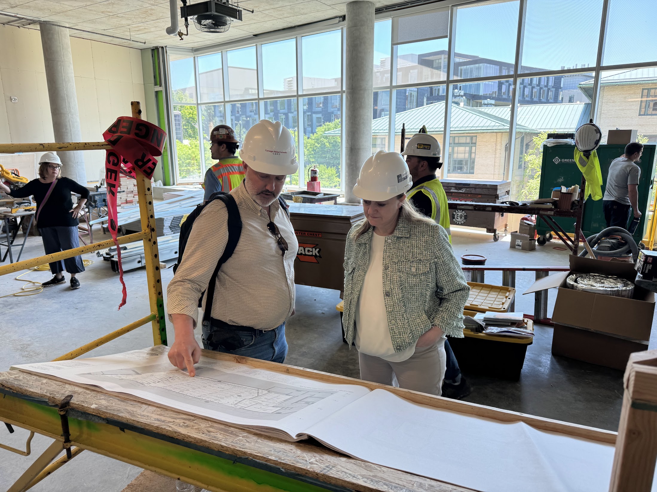 Dean Isabelle Bajeux and additional staff members got a sneak peek at the ongoing construction on the third floor of the Tepper School.